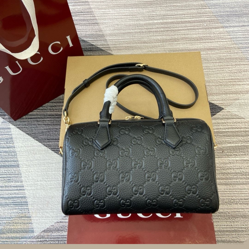 G*u*i top handle bags